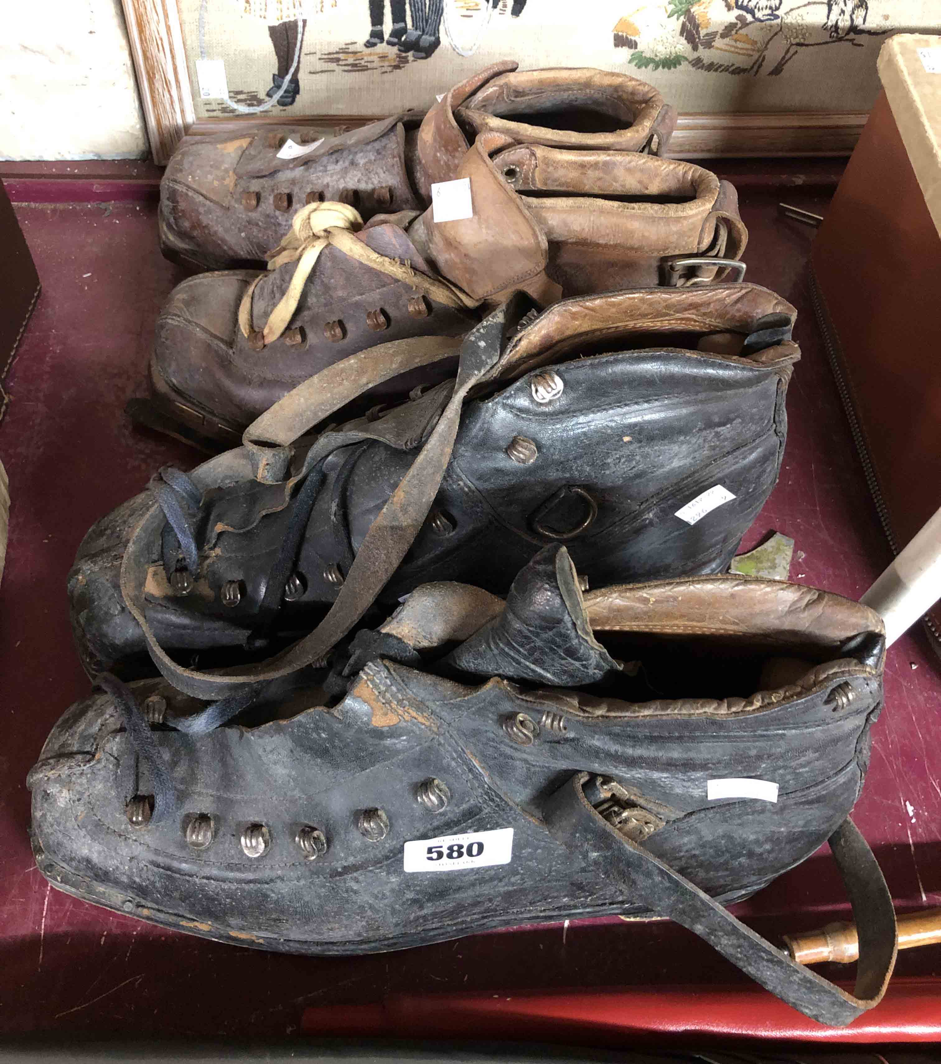 A pair of vintage black leather snow/ski boots - sold with a similar brown pair