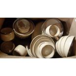 A box containing a large quantity of Denby pottery tea and dinner ware