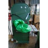 A vintage green painted electric bandsaw - sold with a quantity of replacement blades