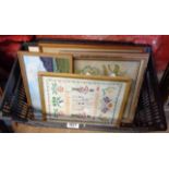 A crate containing a selection of textile pictures including crewel style and others, also a