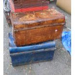 Two old lift-top tin trunks, one with blue painted finish