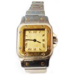 A Cartier Santos Galbee bi-metal lady's quartz wristwatch, complete with paperwork, presentation and