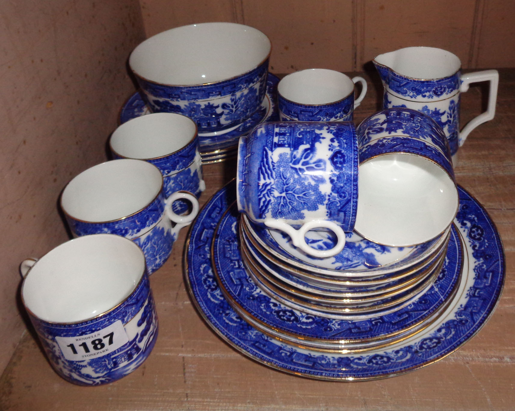 A Royal Albert bone china part tea set with blue transfer printed Willow pattern decoration