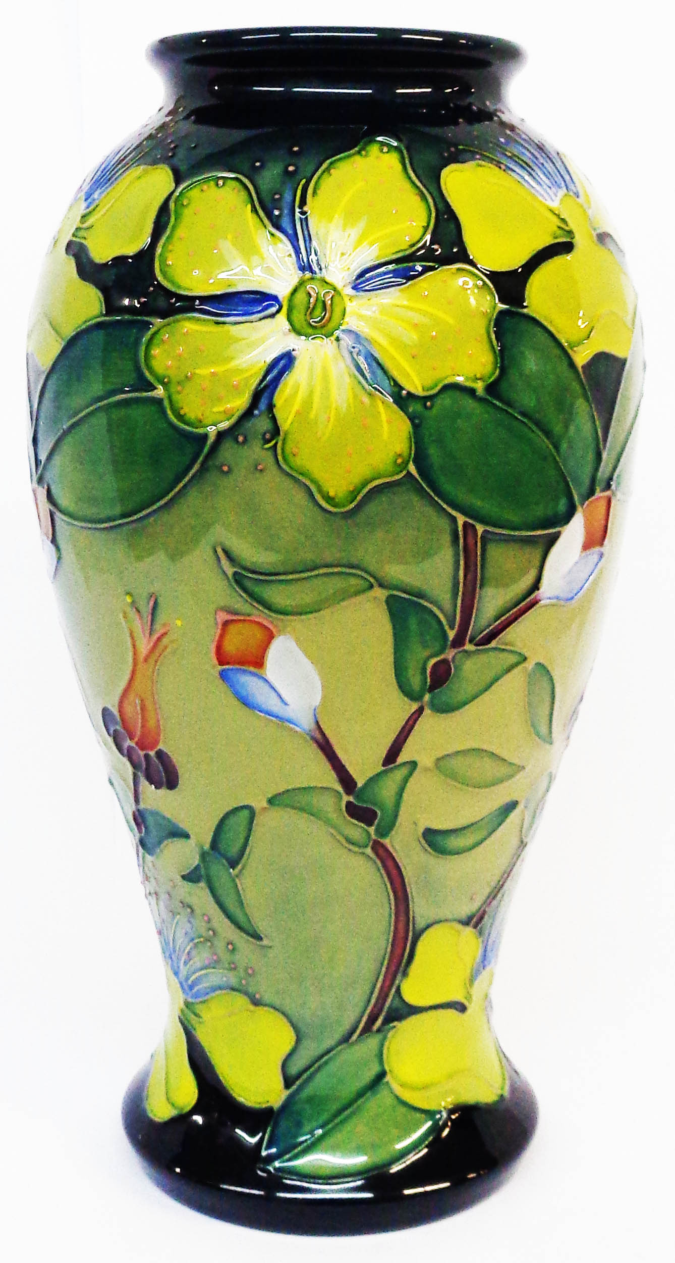 A large Moorcroft vase of baluster form with tube lined floral decoration - with impressed marks and