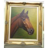 A 20th Century Continental oil on canvas study of a bay horse's head - indistinctly signed