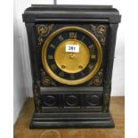 A late Victorian black slate and gilt incised lined cased Aesthetic Movement mantel clock with Gay