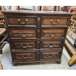 A 91cm antique oak chest in the Jacobean style of two short and three long graduated drawers, set on