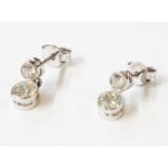 A pair of 750 white gold two stone drop stud earrings - 1.20ct TDW - boxed
