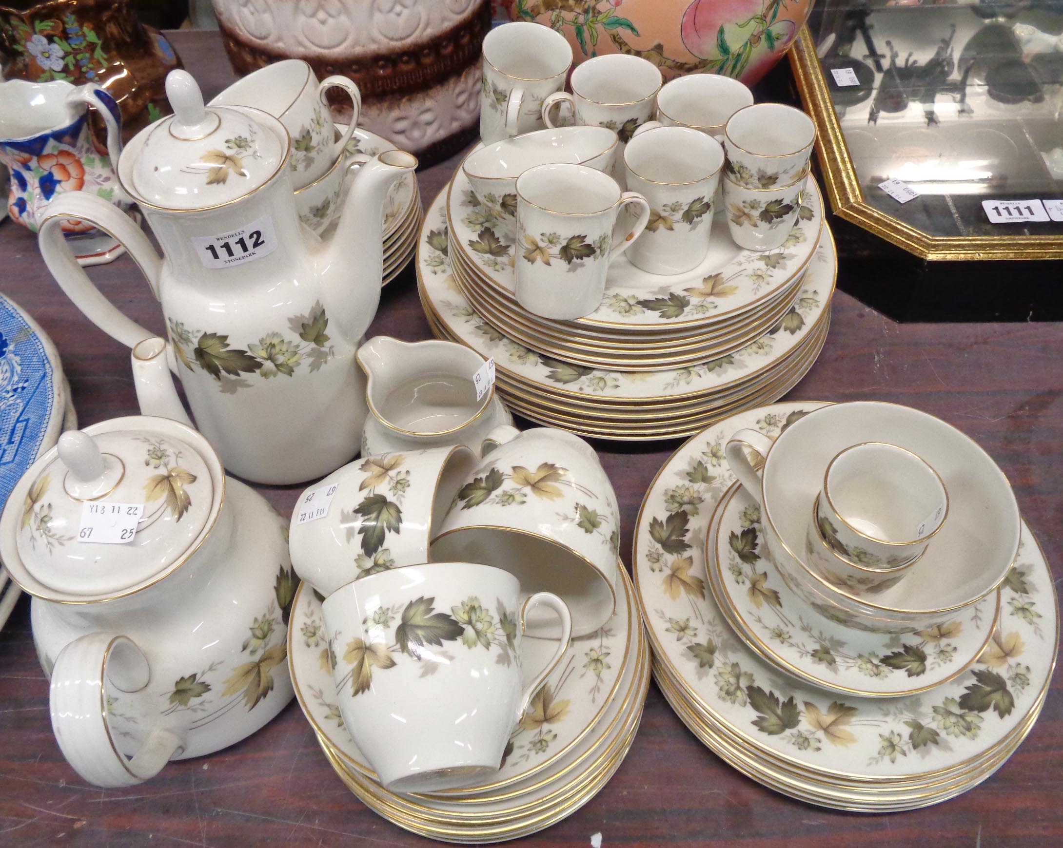 A quantity of Royal Doulton tea and dinner ware in the Larchmont pattern including coffee pot,