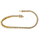 A 750 (18ct.) yellow gold tennis/inline bracelet, each of the links set with an individual brilliant