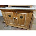 A 1.02m old waxed pine larder cupboard with perforated brass vents to the pair of panelled doors,