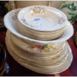 A Bovey Pottery fruit set decorated with coloured transfer printed floral sprays comprising six