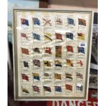 A framed and glazed display of thirty six Kensitas Silks from the British Empire Flags series