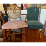 A vintage upholstered boudoir chair, set on cabriole front legs - sold with a sabre leg dining chair