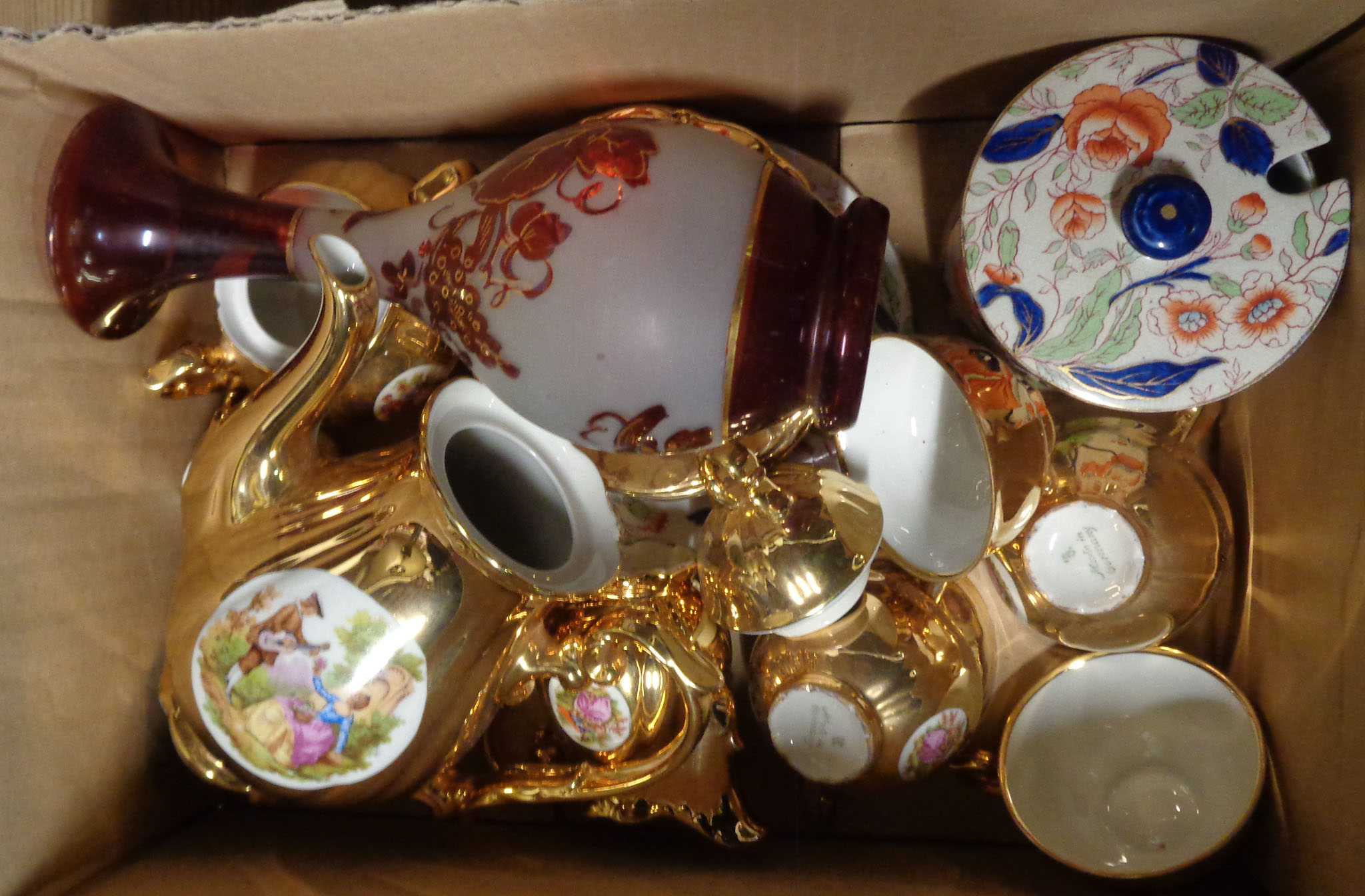 A box containing a quantity of ceramic and glass items comprising German gold lustre coffee set,