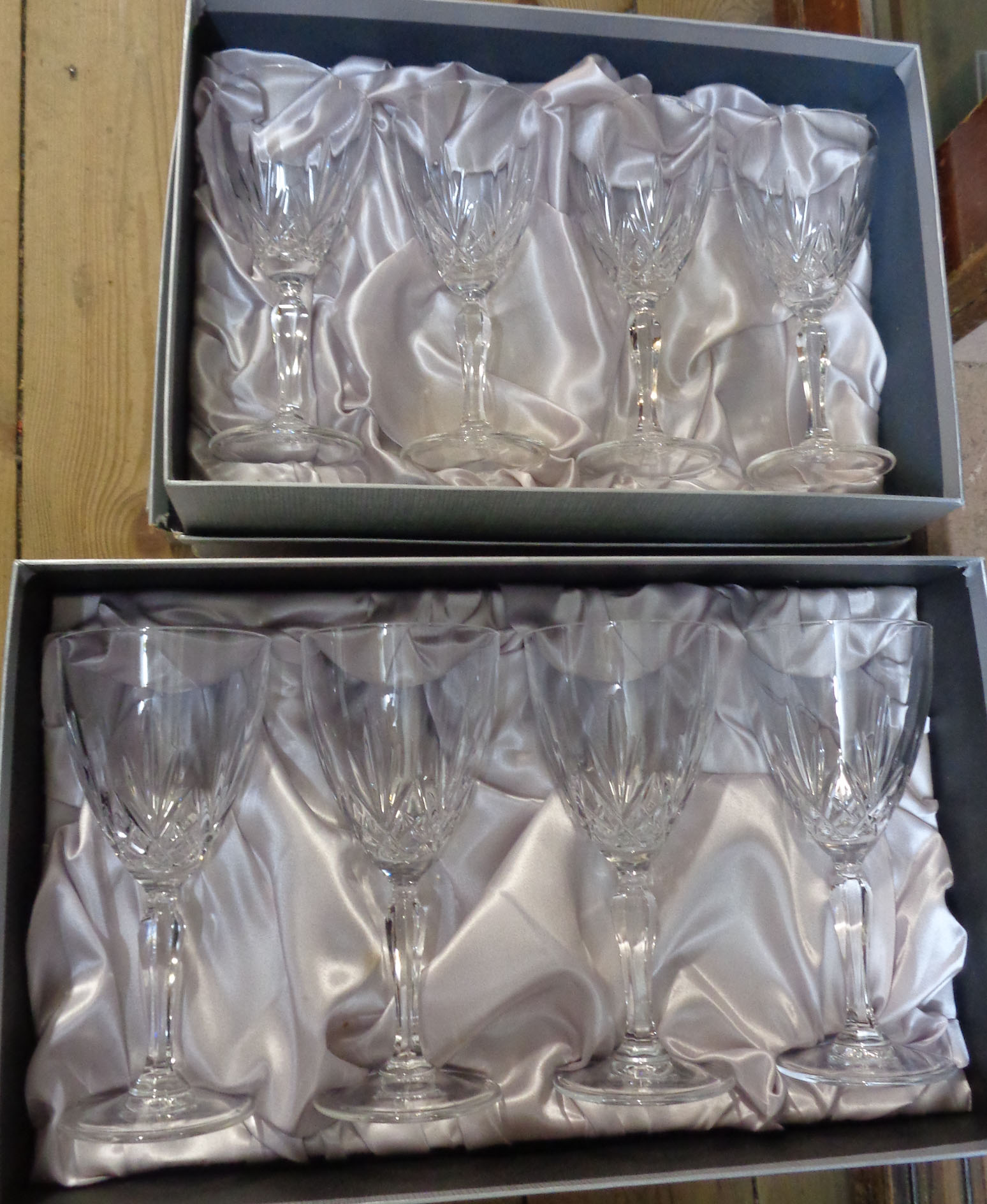 Six boxed four glass sets of Buckingham lead crystal wine glasses from the Debenham Gifts