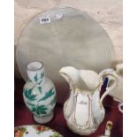 A 19th Century Davenport bone china jug, a Victorian cased opaque glass vase with green painted