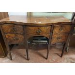 A 1.2m 19th Century mahogany serpentine front sideboard with central frieze drawer and flanking