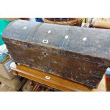 A 78cm Victorian stained pine dome top travelling trunk with iron strapping and flanking drop