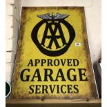A modern reproduction printed tin sign A.A. Approved Garage Services