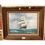 Cooper: an oak and hessian framed oil on canvas, depicting a sailing ship on choppy seas - signed