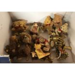 A box containing a quantity of cast resin teddy bear figurines, etc.