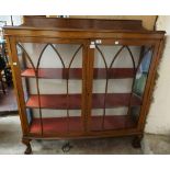 A 1.2m vintage oak display cabinet with material lined interior enclosed by a pair of Gothic