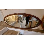 An early 20th Century mahogany framed oval mirror - from a cheval mirror