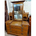 A 1.22m early 20th Century Arts & Crafts Movement inlaid oak dressing chest with large bevelled