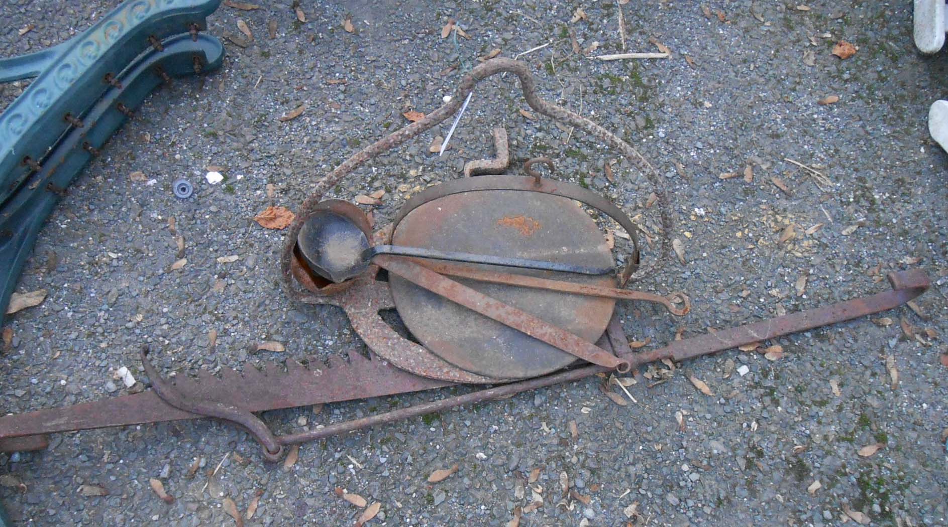 A quantity of assorted metalware including chimney crook, ladles, etc.