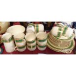 A Victorian bone china part tea set comprising eleven trios, milk and slop bowl, two bread and