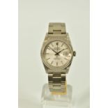 A ROLEX OYSTER PERPETUAL DATEJUST WRISTWATCH, model 16620, silver coloured stripped dial, baton