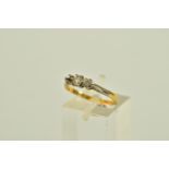 A DIAMOND RING, designed as a graduated three stone diamond ring, one side diamond missing,