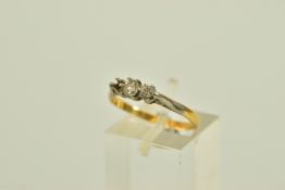 A DIAMOND RING, designed as a graduated three stone diamond ring, one side diamond missing,
