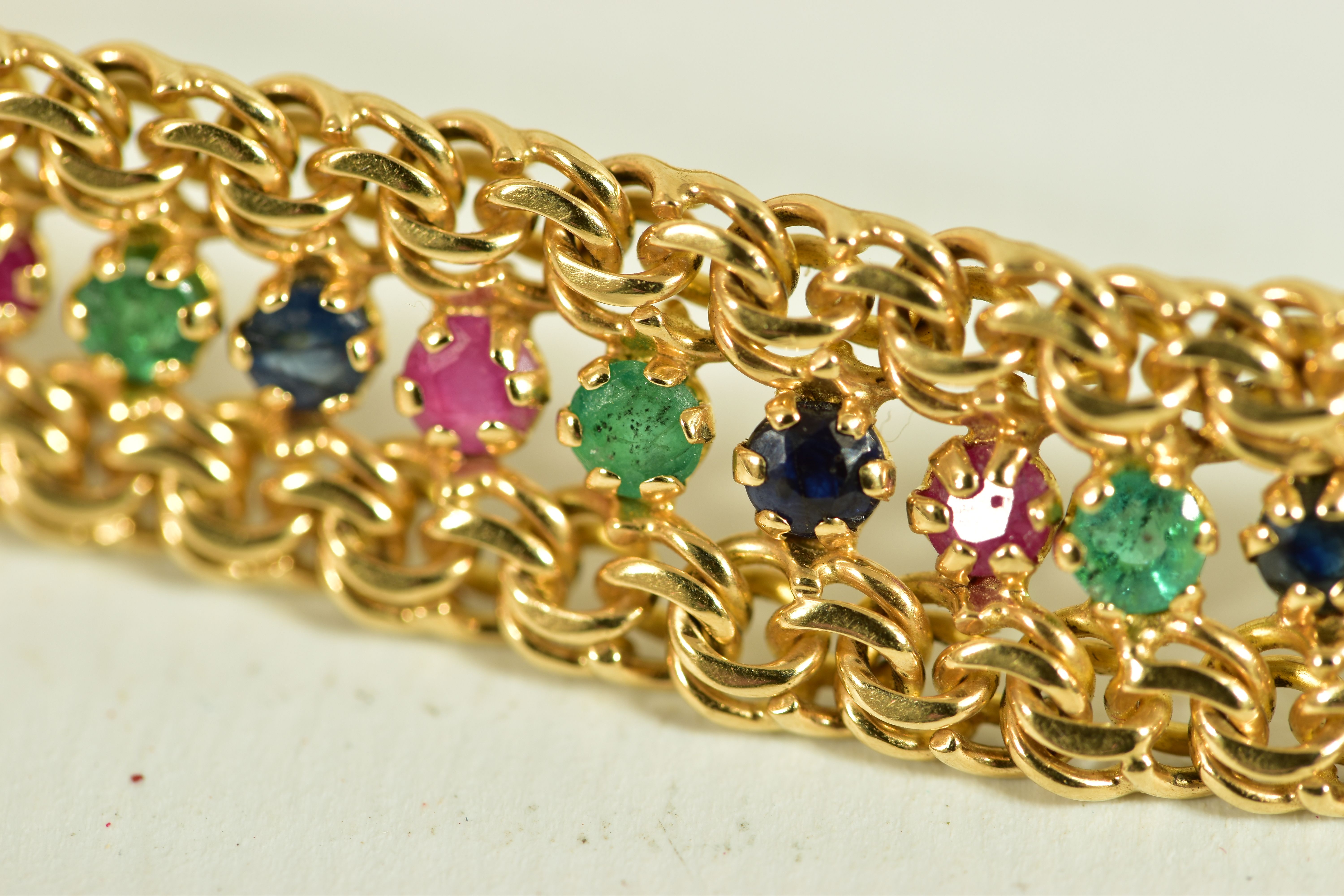 A MULTI-GEM SET BRACELET, set with emeralds, sapphires and rubys, clasp stamped 585, each stone claw - Image 2 of 6