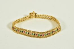 A MULTI-GEM SET BRACELET, set with emeralds, sapphires and rubys, clasp stamped 585, each stone claw