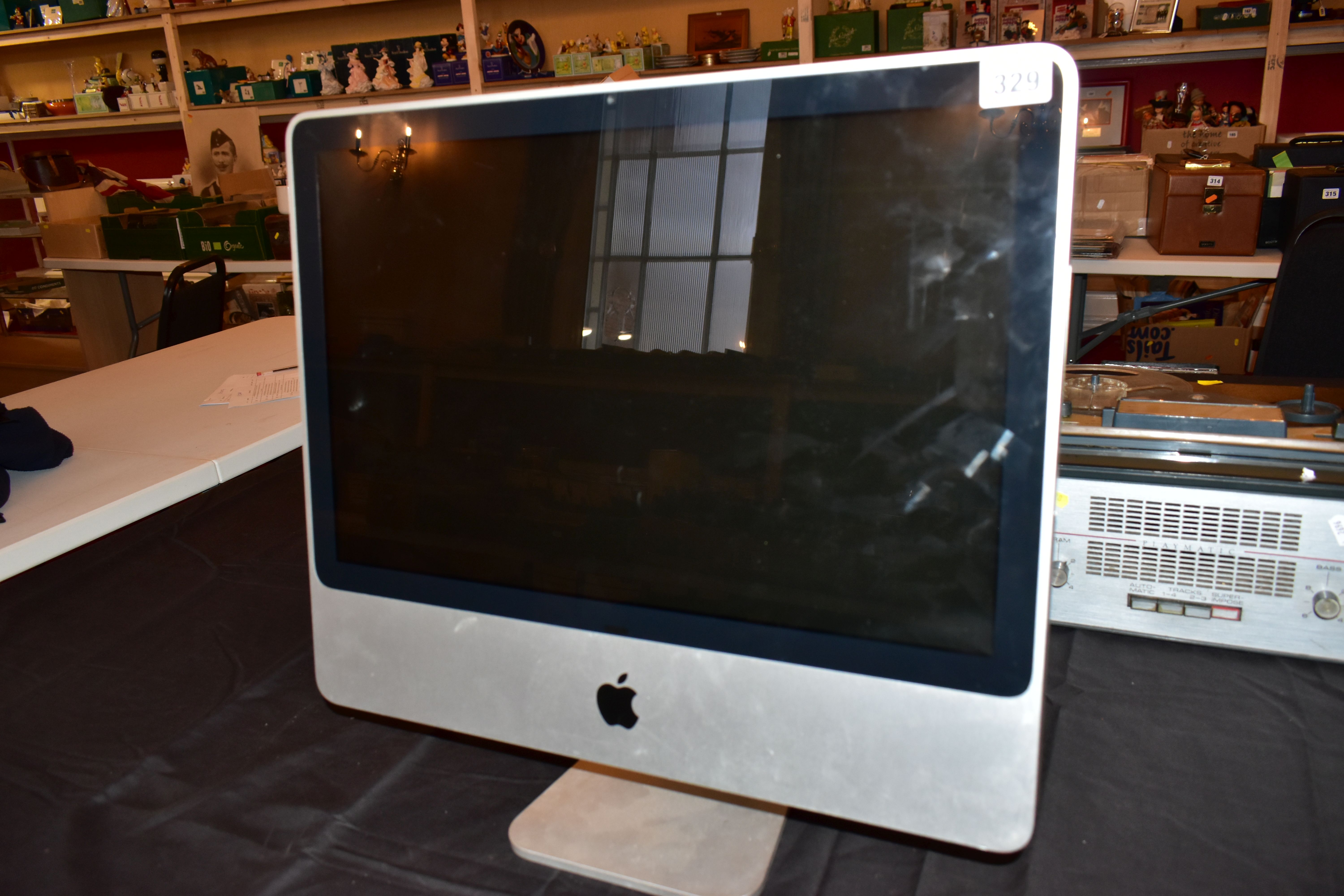 AN APPLE IMAC MODEL A1224 Serial No W8734DZ9X85 for spares or repairs ( condition of the case is