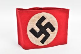 A NAZI THIRD REICH NSDAP ARMBAND, nicely stitched to top and bottom as too the circular Swastika,