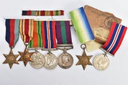 A GROUP OF SECOND WORLD WAR MEDALS ON A WEARING BAR, to include 1939-45, Africa Stars, War Medal &