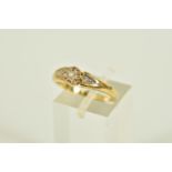 A 9CT GOLD DIAMOND RING, centring on an illusion set round brilliant cut diamond, single cut diamond