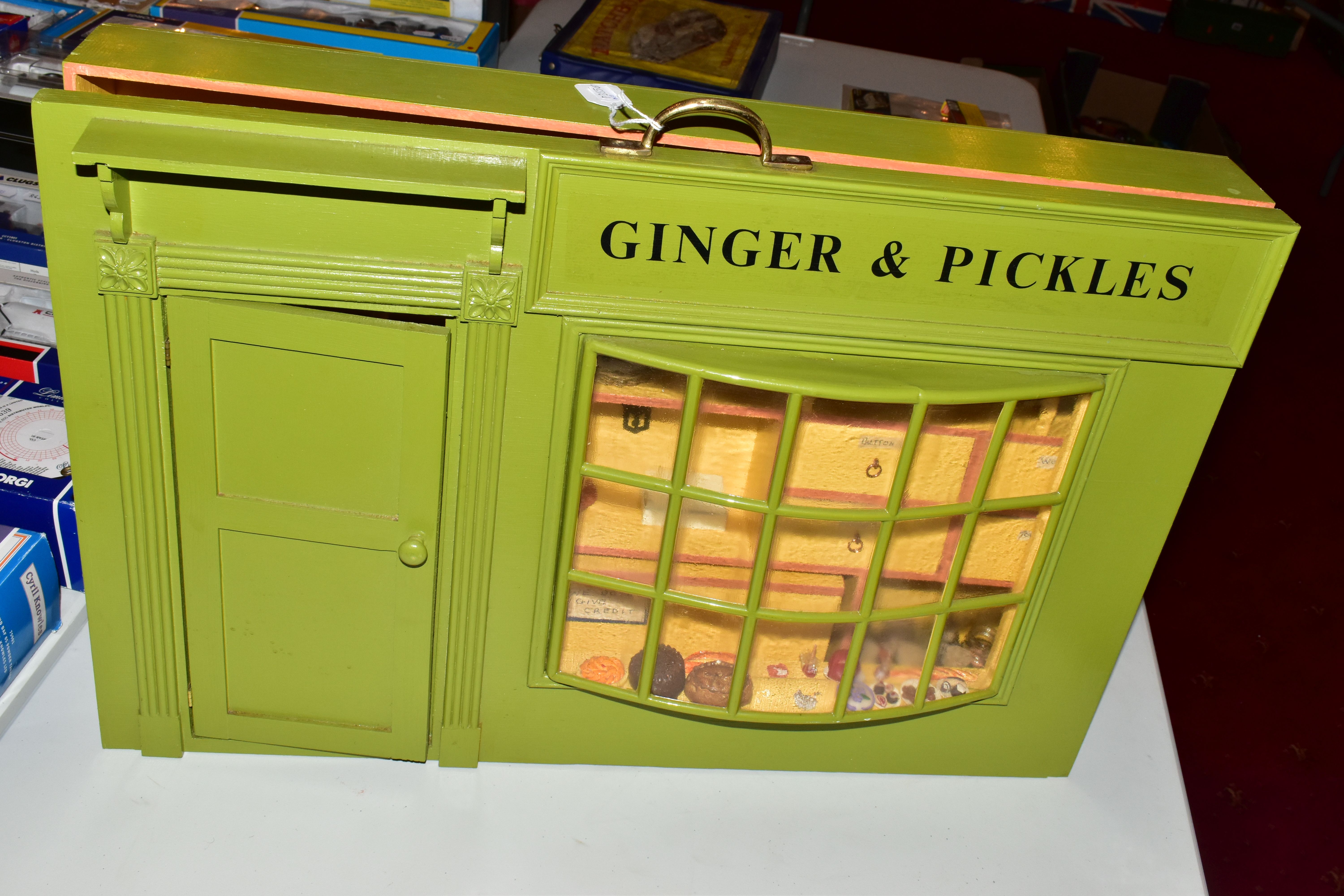 A WOODEN TOY GINGER & PICKLES SHOP AND CONTENTS, green painted Georgian style shopfront with bow - Image 10 of 11