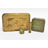 A WORLD WAR ONE PRINCESS MARY TIN, containing a smaller possibly WW2 era tin containing a bottle