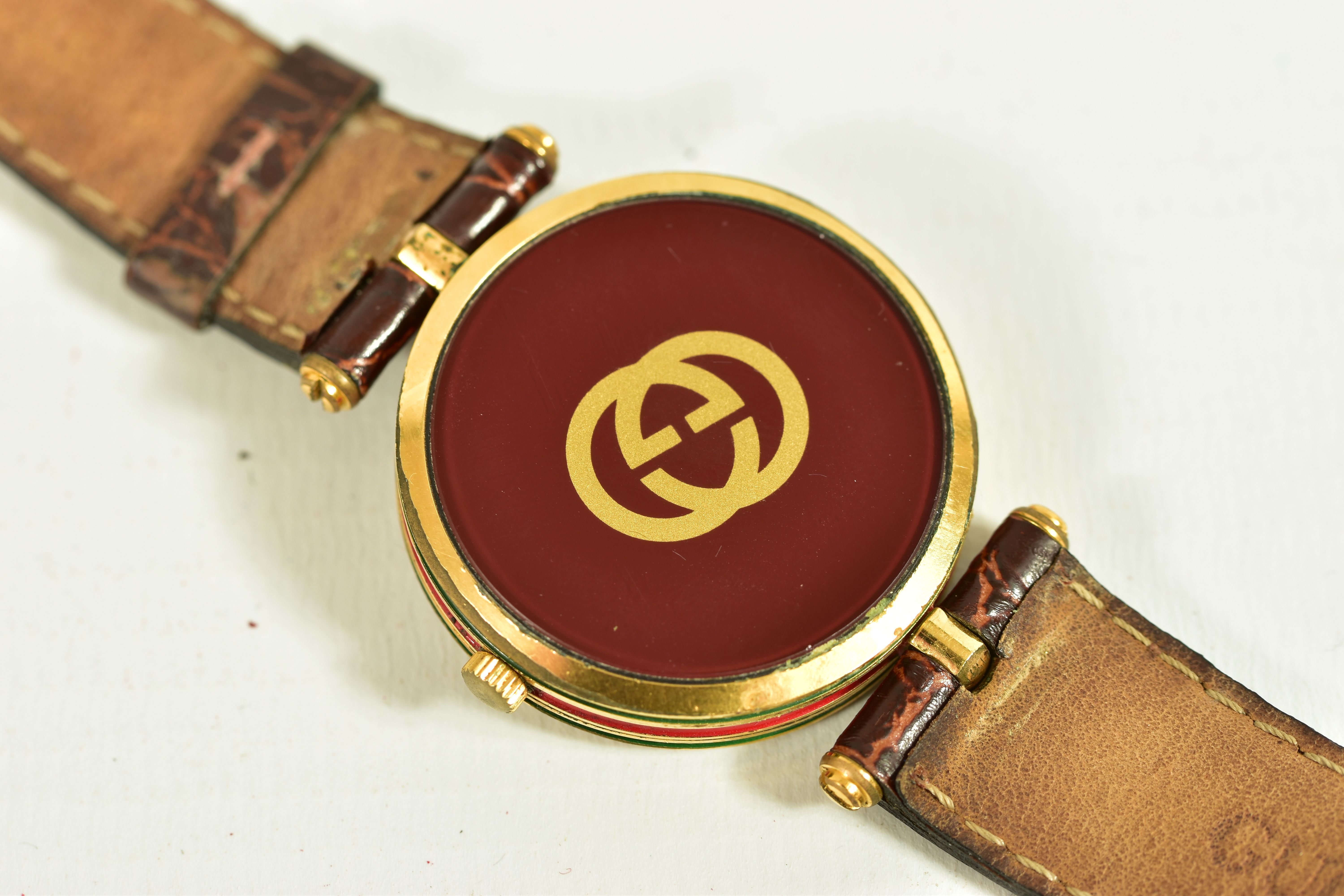 A GOLD-PLATED GUCCI QUARTZ WRISTWATCH, cream dial with roman numerals, round dial with red and green - Image 4 of 4