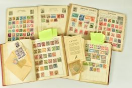 FOUR ALBUMS OF WORLDWIDE STAMPS, including two well filled albums with some interest in German