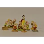 ELEVEN BOXED ROYAL DOULTON WALT DISNEYS CLASSIC SNOW WHITE AND THE SEVEN DWARFS FIGURES,