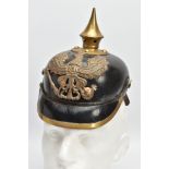 A FIRST WORLD WAR IMPERIAL GERMAN PICKELHAUBE HELMET, Leather and brass design, officially marked to