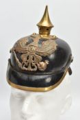 A FIRST WORLD WAR IMPERIAL GERMAN PICKELHAUBE HELMET, Leather and brass design, officially marked to