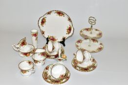 A ROYAL ALBERT OLD COUNTRY ROSES TEASET, ETC, comprising a two tier cake stand, a cake/sandwich