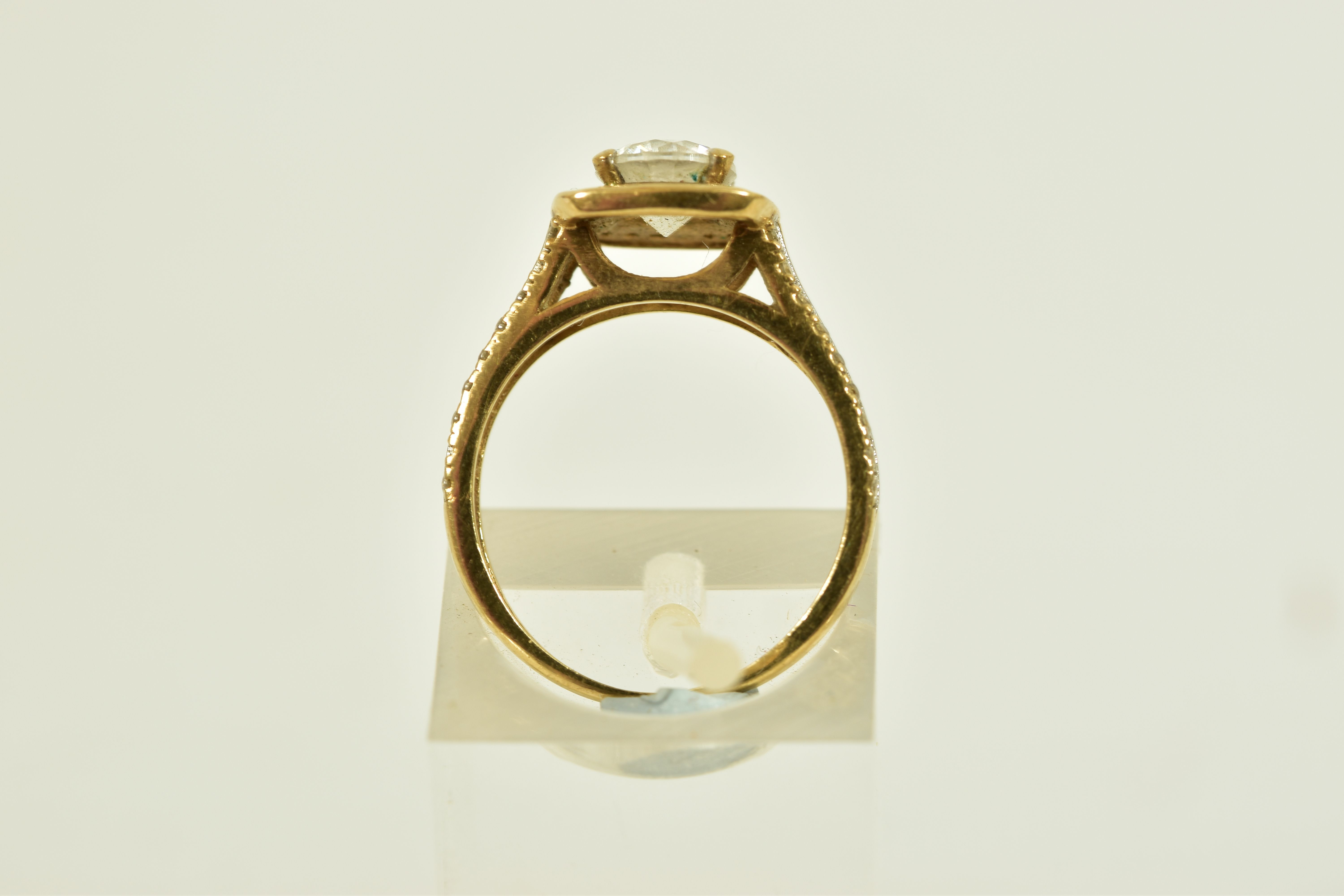 A 9CT GOLD CUBIC ZIRCONIA SET RING, designed with a central four claw set, circular cut, - Image 4 of 4