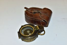A SINCLAIR HAYMARKET LONDON COMPASS, with a leather case (Condition report: dial has been